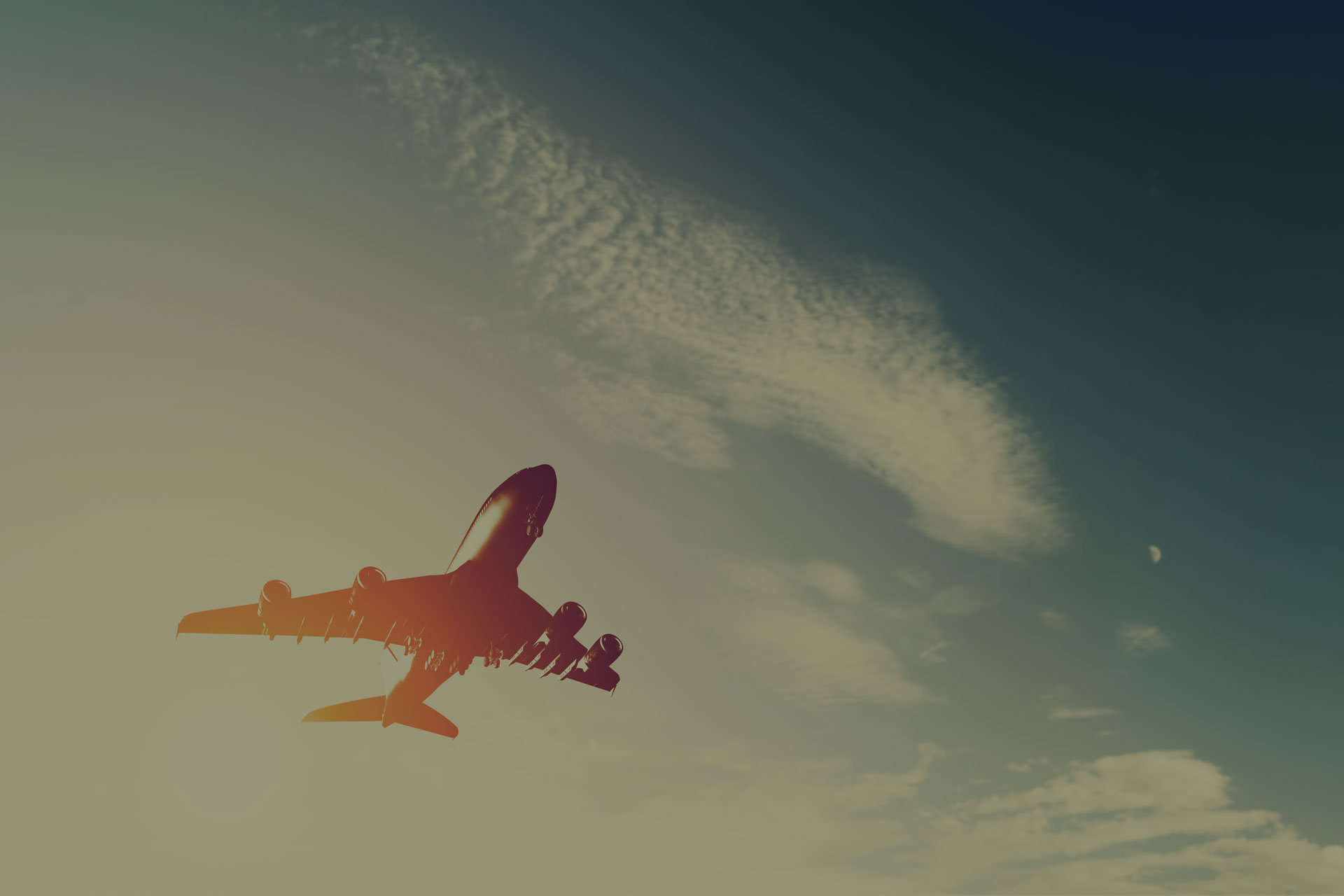 Airplane flying through the sky