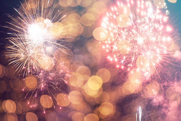 Fireworks at New Year and copy space - abstract holiday background