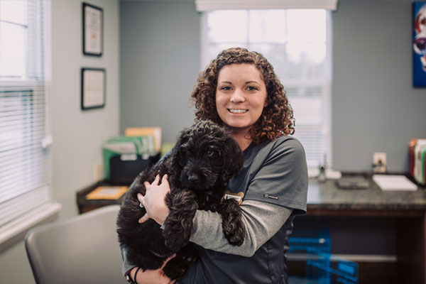 dog Girl holding dog